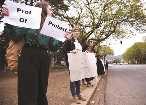 Academic staff at the University of KwaZulu Natal protest in Pietermaritzburg, South Africa, yesterday in support of students demanding free tertiary education.