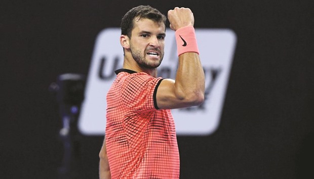 Grigor Dimitrov of Bulgaria  exults during his win over  Rafael Nadal of Spain at the China Open tennis tournament in Beijing yesterday. (AFP)