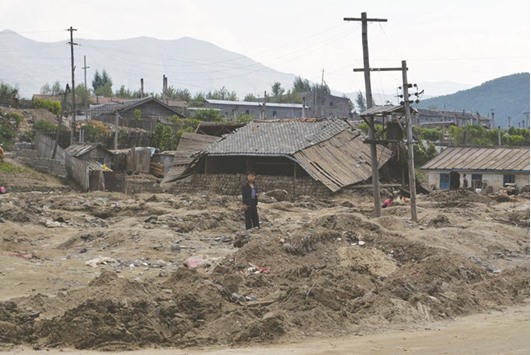 WINTER IS COMING: This handout picture taken on the September 25 and released by Save the Children shows the destruction to homes after heavy flooding at the Tumen river, near Musan in the north of North Korea.
