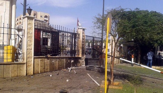 A view shows the damage at the site of a suicide bomb attack in the Syrian government-held city of Hama, Syria.