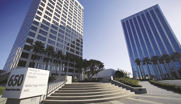 The office of Pacific Investment Management Co is seen in Newport Beach, California. Many institutional investors choose uniform currency protection for each asset class, and that means they miss out on the opportunity to benefit from the way some exchange rates are correlated with moves in riskier assets, says Pimco.