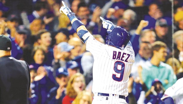 Chicago Cubsu2019 Javier Baez (9) acknowledges the crowd after hitting a home run against the San Francisco Giants.