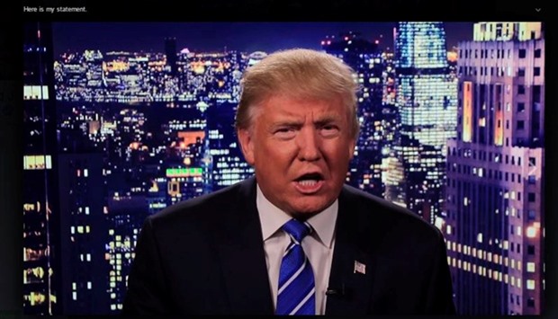 Republican US presidential nominee Donald Trump is seen in a video screengrab as he apologizes for lewd comments he made about women during a statement recorded by his presidential campaign and released via social media after midnight October 8, 2016. Reuters