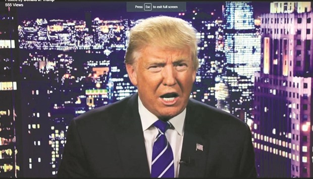 Trump is seen in a video screengrab as he apologises for lewd comments he made about women during a statement recorded by his presidential campaign and released via social media yesterday.