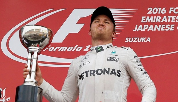 Mercedes' driver Nico Rosberg of Germany celebrates winning the race