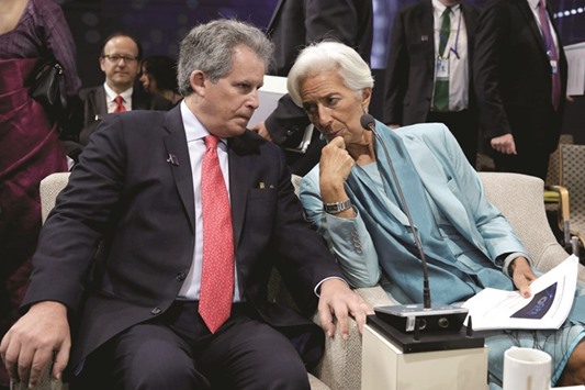 International Monetary Fund managing director Christine Lagarde (right) chats with David Lipton, first deputy managing director of the Fund, at the IMF-World Bank annual meetings in Washington. Lipton shrugged off the view that monetary policy was nearing its limit as a means to revive economies across the globe, stressing that central banks must be open to new ideas to help spur growth.