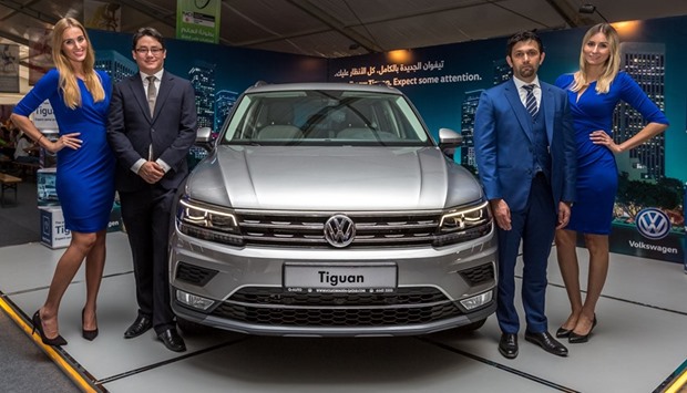 Q-Auto general manager Ahmed Shariefi (second right) and Audi & Volkswagen marketing manager Anthony Kwan (second, left) led the unveiling of the all-new Tiguan yesterday at the 2016 UCI Road World Championships.