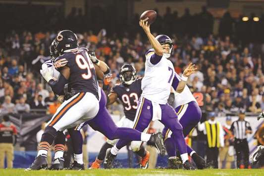 Minnesota Vikings quarterback Case Keenum passes against the Chicago Bears during the second-half of their NFLgame at Soldier Field. PICTURE: USA TODAY Sports
