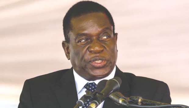 Mnangagwa: stripped of his role as justice minister and reassigned the finance minister.
