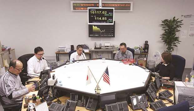 Currency traders work in the dealing room of a foreign exchange brokerage in Tokyo. Itu2019s been five years since politics captured much attention from the foreign-exchange world in Japan, but market players are now gaming out potential scenarios for the yen from the October 22 general election.