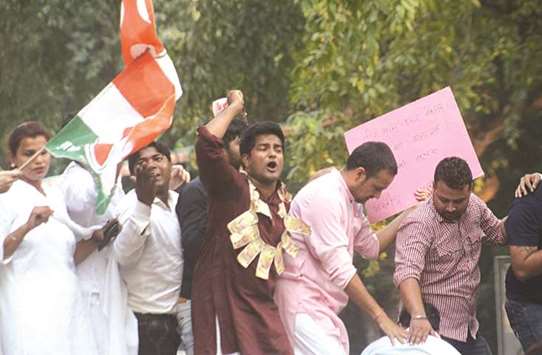 Youth Congress activists stage a demonstration against Jay Shah, son of BJP chief Amit Shah, in New Delhi yesterday.