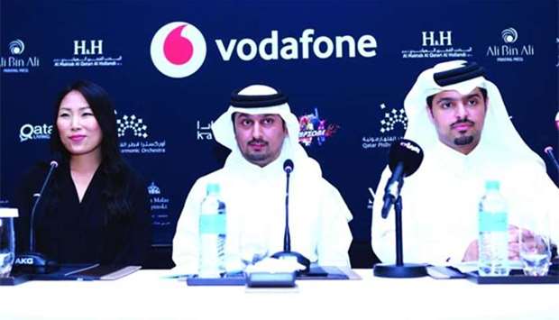 Sonja Park, Abdullah al-Kubaisi and Sheikh Hamad bin Abdullah al-Thani at the press conference on Wednesday.