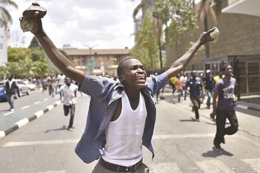 A supporter of the opposition-led National Super Alliance (NASA) gestures in Nairobi yesterday.