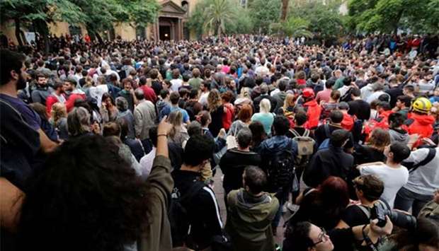 People stand at a courtyard outside a polling station during an independence referendum in Barcelona on Sunday.
