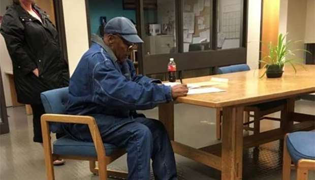 O.J. Simpson signing documents before leaving Lovelock Correctional Centre early on Sunday.