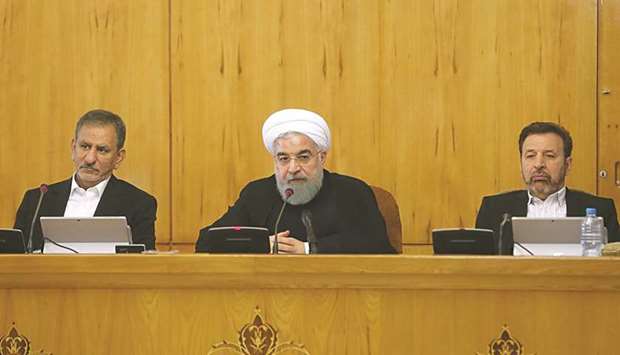 A handout picture provided by the office of Iranian President Hassan Rouhani shows him attending a cabinet meeting in Tehran.