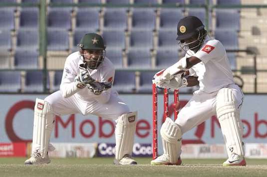 Sri Lankau2019s Kaushal Silva in action during the fourth day of the first Test against Pakistan in Abu Dhabi. (AFP)
