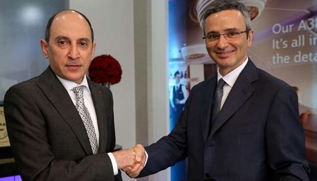 Al-Baker with Rigotti at the agreement signing. Qatar Airways has picked up a 49% stake in AQA Holding, the new parent company of Meridiana airline.