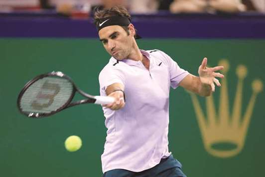 Roger Federer of Switzerland in action against Alexandr Dolgopolov of Ukraine in Shanghai yesterday.