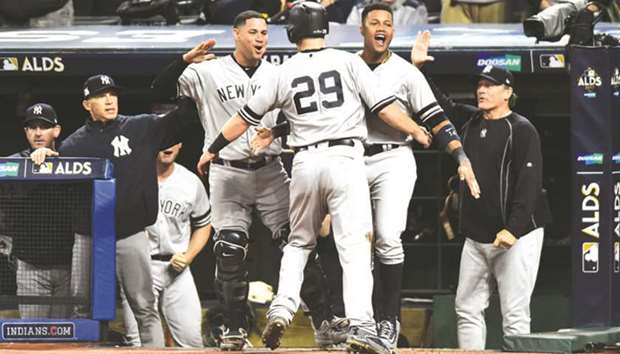 New York Yankees players celebrate after winning the  game five of the playoff baseball series against the Cleveland Indians. (USA TODAY Sports)