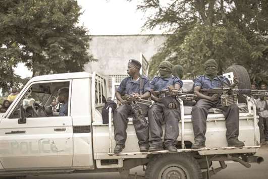 Burundi police on patrol: with the government unwilling to protect its population, it falls to the international community to provide that shield.