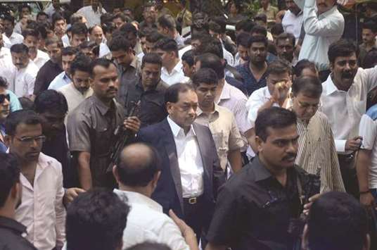 Narayan Rane arrives to address a press conference in Mumbai yesterday.