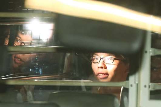 Hong Kong student leader Joshua Wong in custody in this file picture.