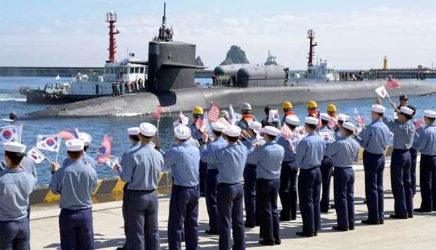 The Ohio-class guided-missile submarine USS Michigan pulls into Busan Naval Base in South Korea