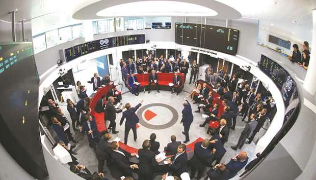 Traders react on the trading floor of the open outcry pit at the London Metal Exchange. About 1.8mn contracts in copper, aluminium and other metals traded on the LME on September 15, according to statistics released last week.