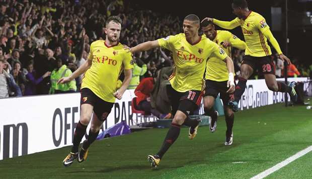 Watfordu2019s Tom Cleverley celebrates scoring the winning goal against Arsenal in the English Premier League yesterday.