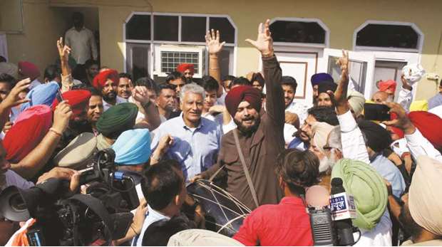 Sunil Jakhar, Punjab minister Navjot Singh Sidhu and other Congress leaders celebrate after the partyu2019s victory in Gurdaspur yesterday.