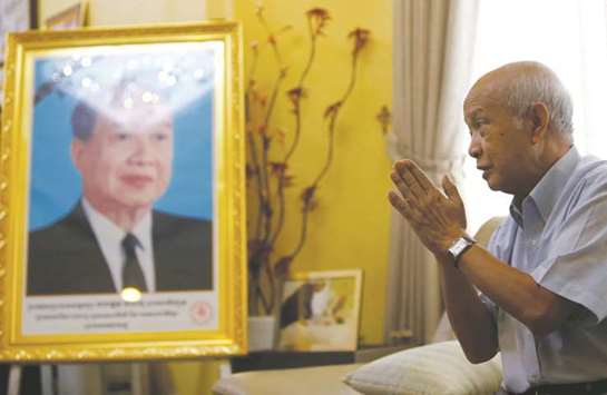 Prince Norodom Ranariddh gestures during an interview at his home in central Phnom Penh, Cambodia, yesterday.