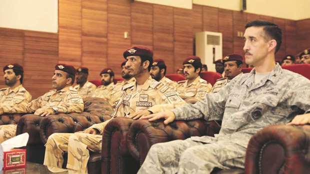 Brigadier General Hamad bin Abdullah al-Fetais al-Marri, joint special forces commander, and Col David Keesey, US defence attache in Qatar, and other officials at the event.