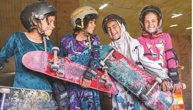 An image from The Skate Girls of Kabul photo series at the QM Gallery Katara.