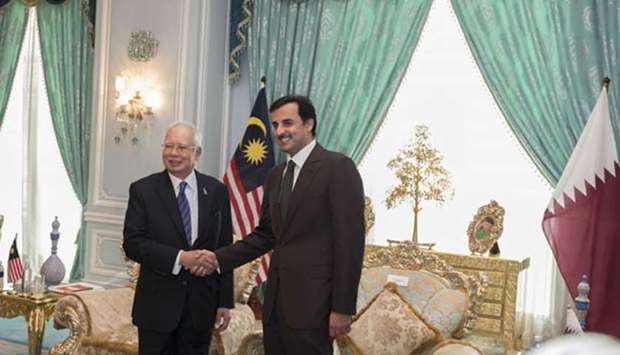 His Highness the Emir Sheikh Tamim bin Hamad al-Thani is pictured with Malaysian Prime Minister Mohammad Najib Tun Abdul Razzak in Kuala Lumpur on Monday.