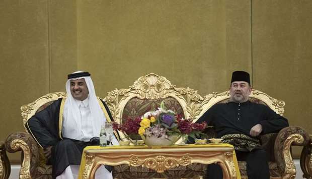 His Highness the Emir Sheikh Tamim bin Hamad Al-Thani with King of Malaysia Sultan Muhammad V at the Royal Istana Negara Palace in Kuala Lumpur
