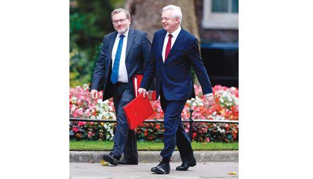 Secretary of State for Exiting the European Union (Brexit Minister) David Davis (right) and Secretary of State for Scotland David Mundell arrive at Downing Street, London, for the weekly Cabinet meeting.
