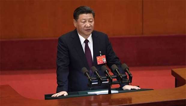 China's President Xi Jinping gives a speech at the opening session of the Chinese Communist Party's five-yearly Congress at the Great Hall of the People in Beijing on Wednesday.