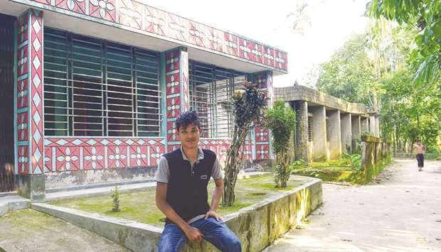 Khaled Hossain posing for a photo during an interview with AFP at his house in Beanibazer in northeastern Bangladeshu2019s Sylhet district.