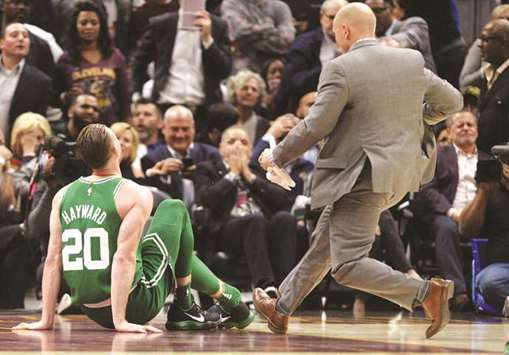 Boston Celtics forward Gordon Hayward sits on the court after injuring his ankle during the first-half against the Cleveland Cavaliers at Quicken Loans Arena. PICTURE: USA TODAY Sports