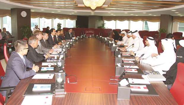 Kahramaa officials and a Russian delegation hold discussions at the Kahramaa headquarters in Doha yesterday.