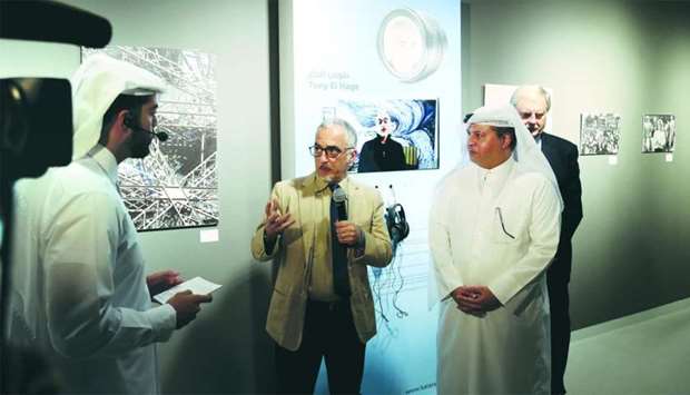 Tony Hage showing his works to Katara deputy general manager Ahmad al-Sayed, dignitaries and guests. PICTURE: Anas Khalid