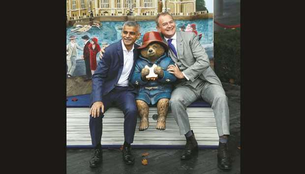London Mayor Sadiq Khan joins actor Hugh Bonneville to launch u201cPaddingtonu2019s Pop-Up Londonu201d at an event to promote the movie, Paddington 2 in London yesterday.