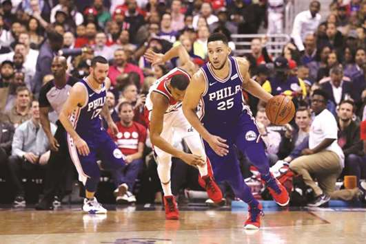 Ben Simmons of the Philadelphia 76ers dribbles the ball against the Washington Wizards players at Capital One Arena in Washington, DC. (Getty Images/AFP)