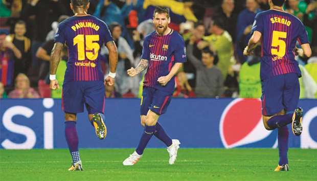 Lionel Messi hit his 100th European goal as the Catalan giants swept aside Olympiakos 3-1 in the Champions League group match on Wednesday night. (AFP)