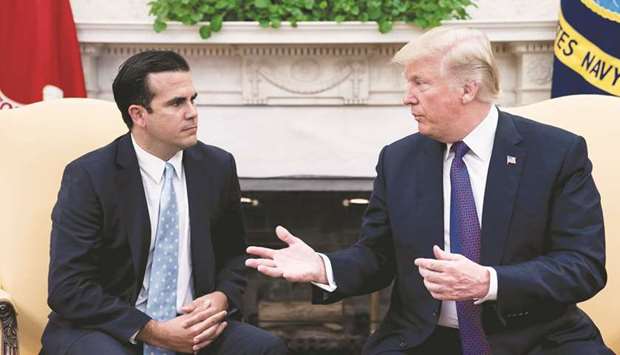 Puerto Rico Governor Rossello with President Trump at the Oval Office.
