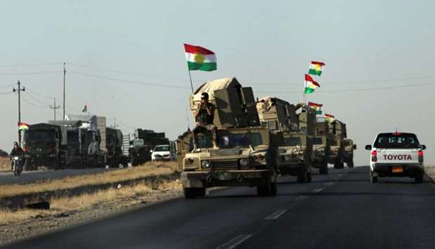 Vehicles of Kurdish Peshmarga Forces are seen near Altun Kupri between Kirkuk and Erbil