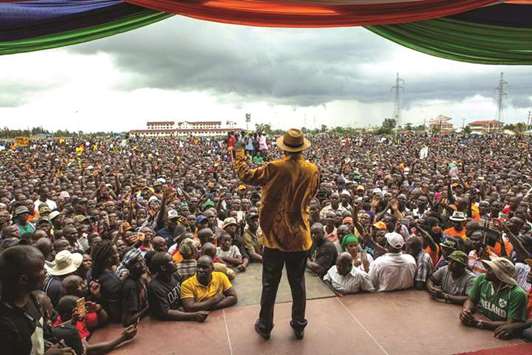 Odinga addresses supporters during a political rally yesterday in his stronghold of Kisumu, in west Kenya.