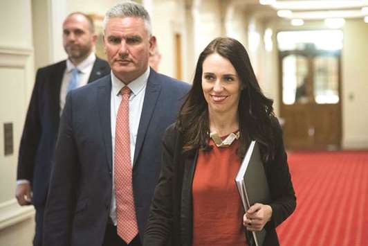 New Zealandu2019s Labour party leader Jacinda Ardern with her deputy Kelvin Davis arrive for a press conference after her first caucus meeting as prime minister-elect at Parliament in  Wellington yesterday.