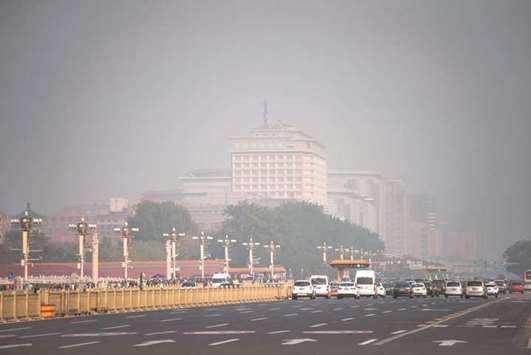 A main road leading to Tiananmen Square on a polluted day during the Communist Partyu2019s 19th Congress in Beijing yesterday.